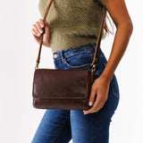 Coldbrew Medium | Model wearing leather Crossbody Bag with Magnetic Messenger Bag Closure