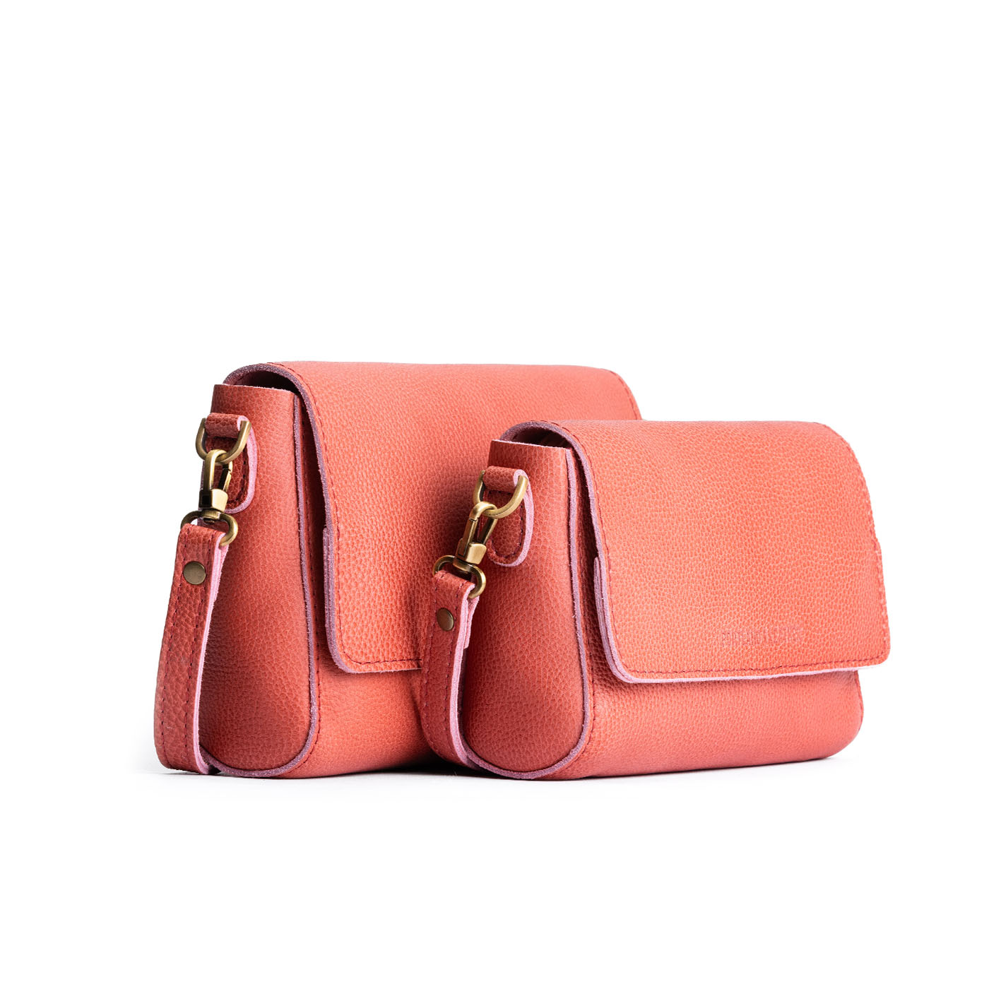 Watermelon | Side by side of both sizes of leather crossbody bag with magnetic messenger bag closure