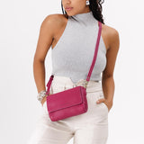 Cosmo Mini | Model Wearing Small Leather Crossbody Bag with Magnetic Messenger Bag Closure