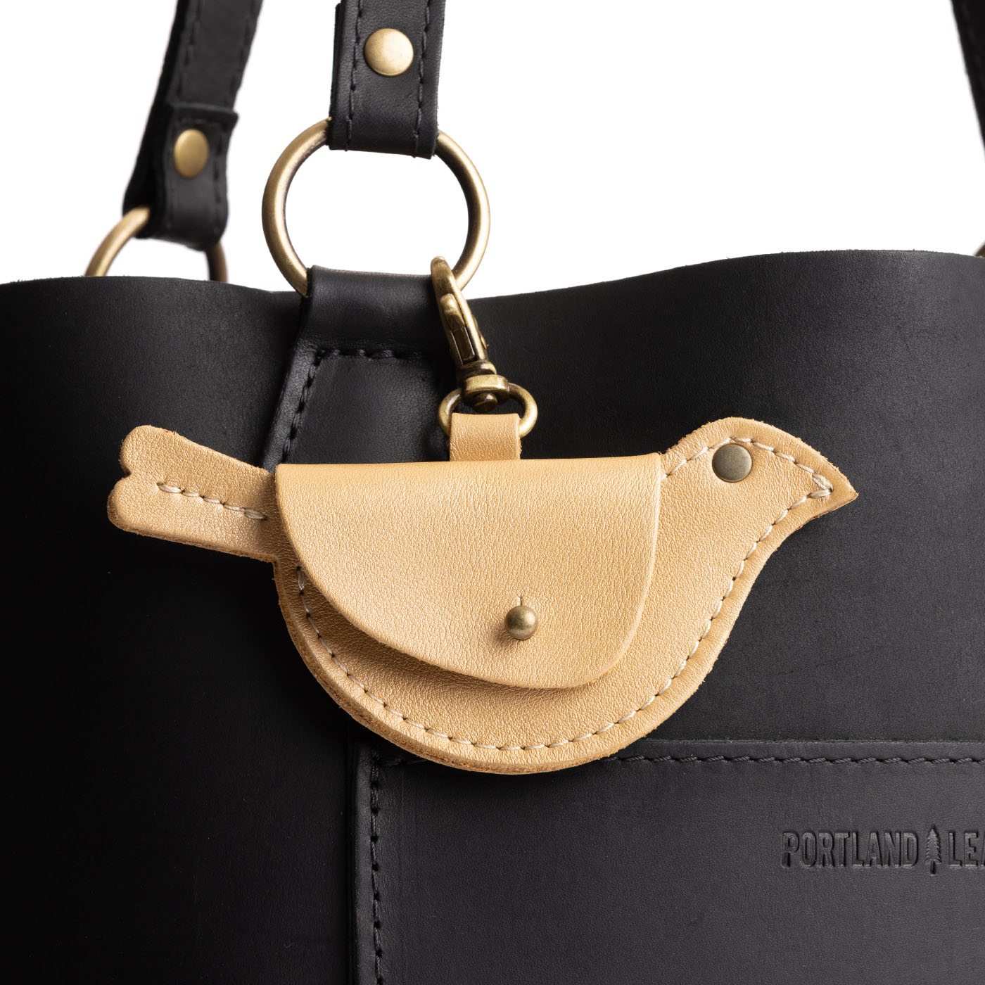 Champagne | Bird shaped pouch with button closure and lobster clasp