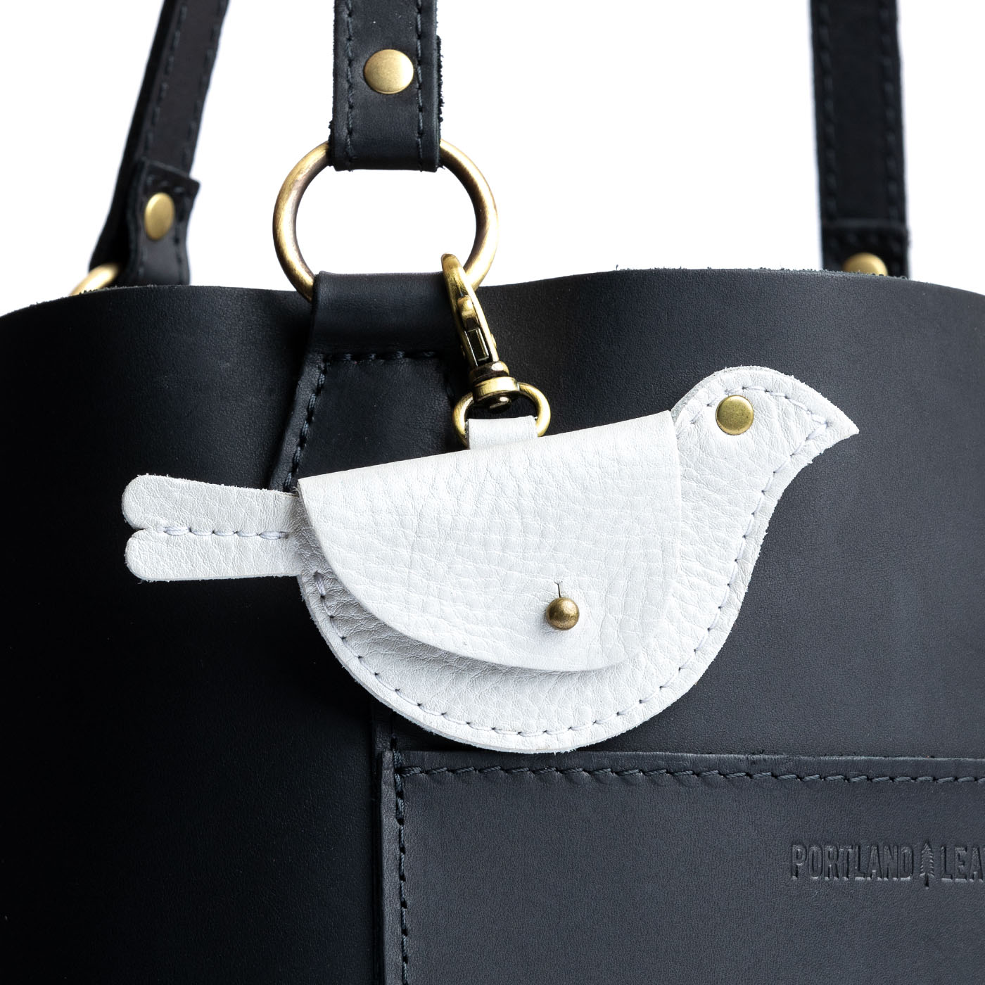 All Color: Pearl | Bird shaped pouch with button closure and lobster clasp