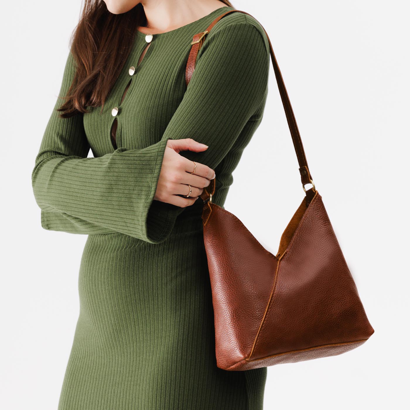 Nutmeg*Small | Model wearing petite shoulder bag with adjustable strap and magnetic snap closure