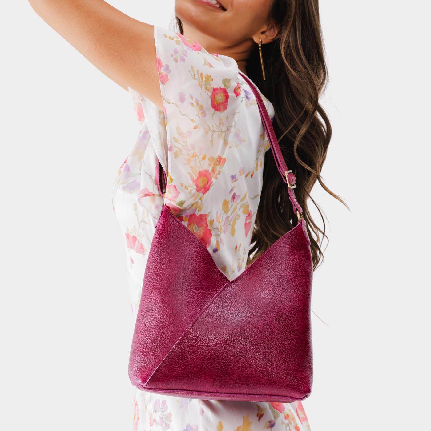 Orchid*Small | Model wearing petite shoulder bag with adjustable strap and magnetic snap closure