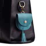 Aqua | U shaped pouch with snap closure, lobster clasp and fringed tassel