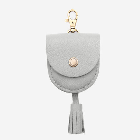 Nimbus | U shaped pouch with snap closure, lobster clasp and fringed tassel