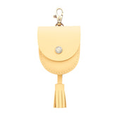 Vanilla | U shaped pouch with snap closure, lobster clasp and fringed tassel