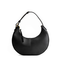 Black*Classic | Crescent shaped shoulder bag with zipper closure and adjustable strap