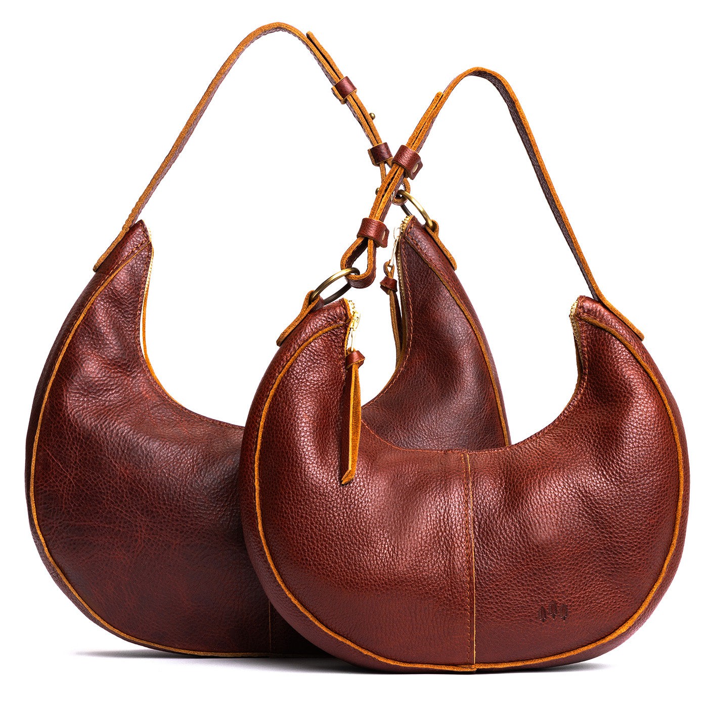 Cinnamon Bear | Crescent shaped shoulder bag with zipper closure and adjustable strap