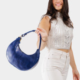 Cowboy Blue Classic | Crescent shaped shoulder bag with zipper closure and adjustable strap