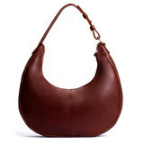 Cognac Large  | Large crescent shaped shoulder bag with zipper closure and adjustable strap