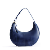 Cowboy Blue Classic | Crescent shaped shoulder bag with zipper closure and adjustable strap