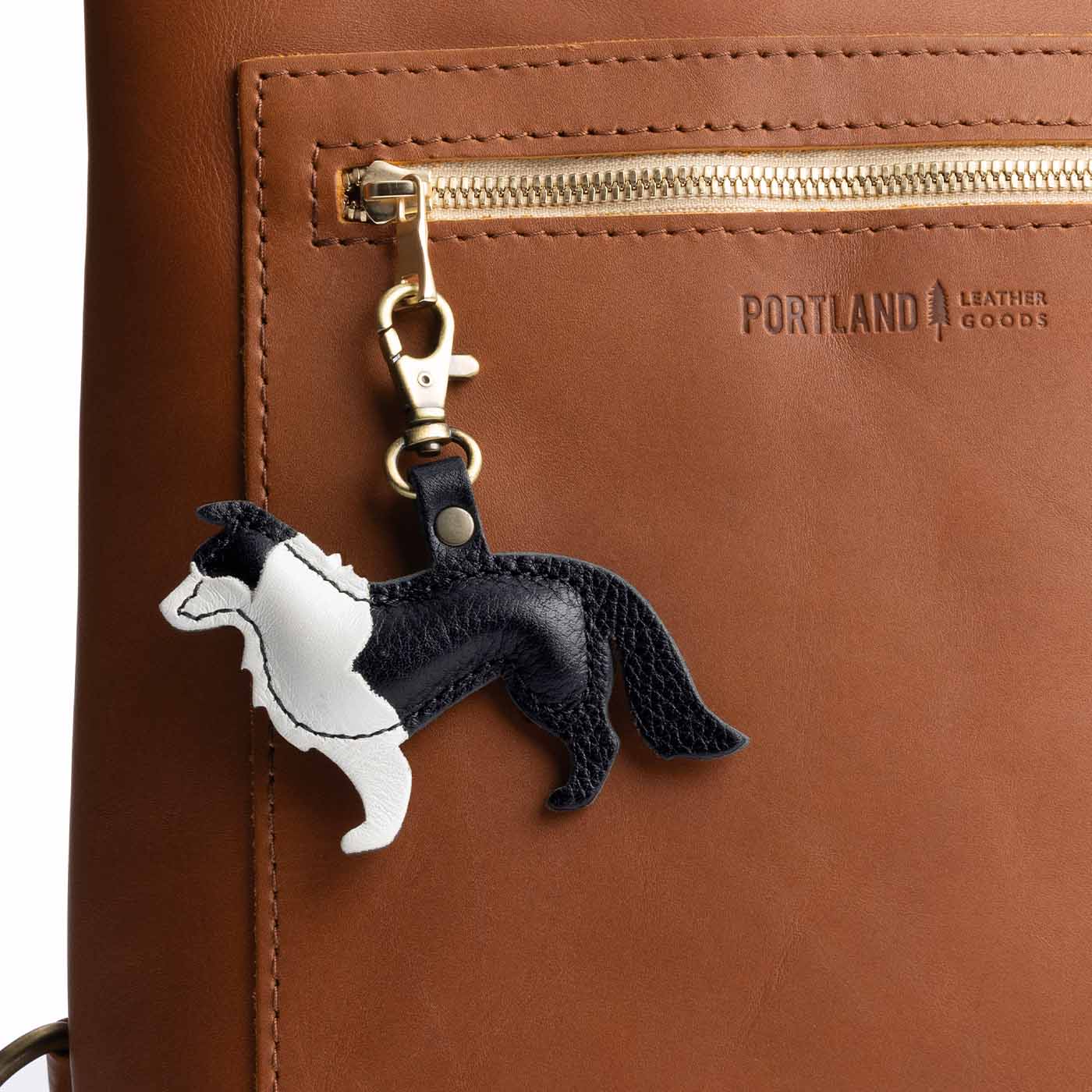 Pebbled--black | Leather border collie shaped keychain with metal lobster clasp