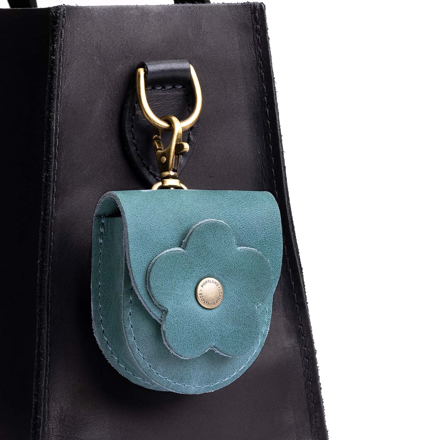 Aqua | U shaped pouch with leather flower applique