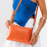 Persimmon | Zip top petite crossbody bag with detachable strap