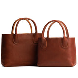 Nutmeg | Side by side of both tote purses with structured leather handles and crossbody strap