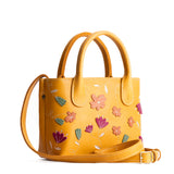 Folklore Sunflower Small | Petite tote purse with embroidered flower design, structured leather handles, and crossbody strap