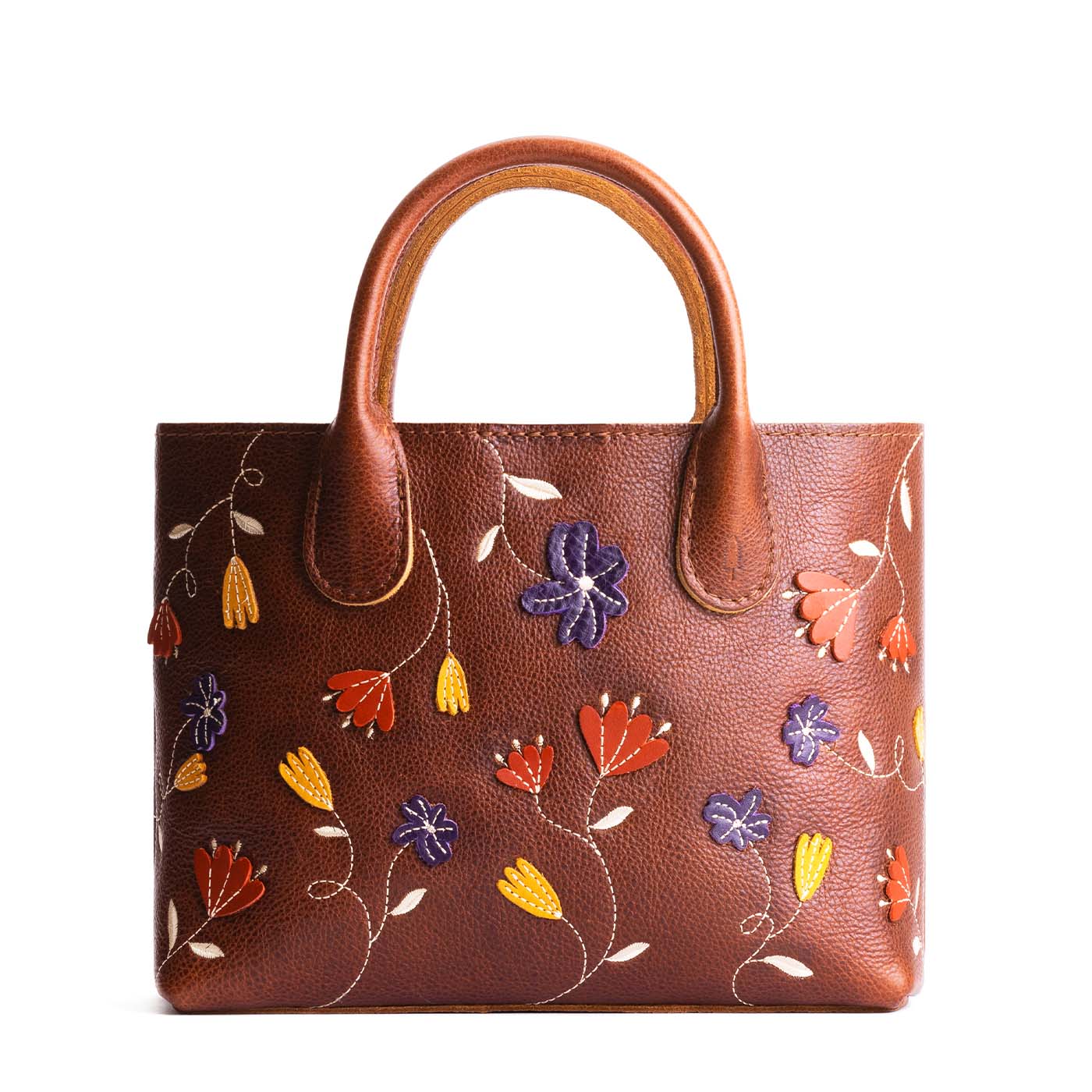 Folklore Nutmeg*Large | Mid-size tote purse with embroidered flower design, structured leather handles, and crossbody strap