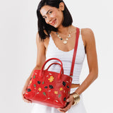 Folklore Ruby Large | Mid-size tote purse with embroidered flower design, structured leather handles, and crossbody strap