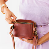 Chestnut | Model using sling bag back zipper