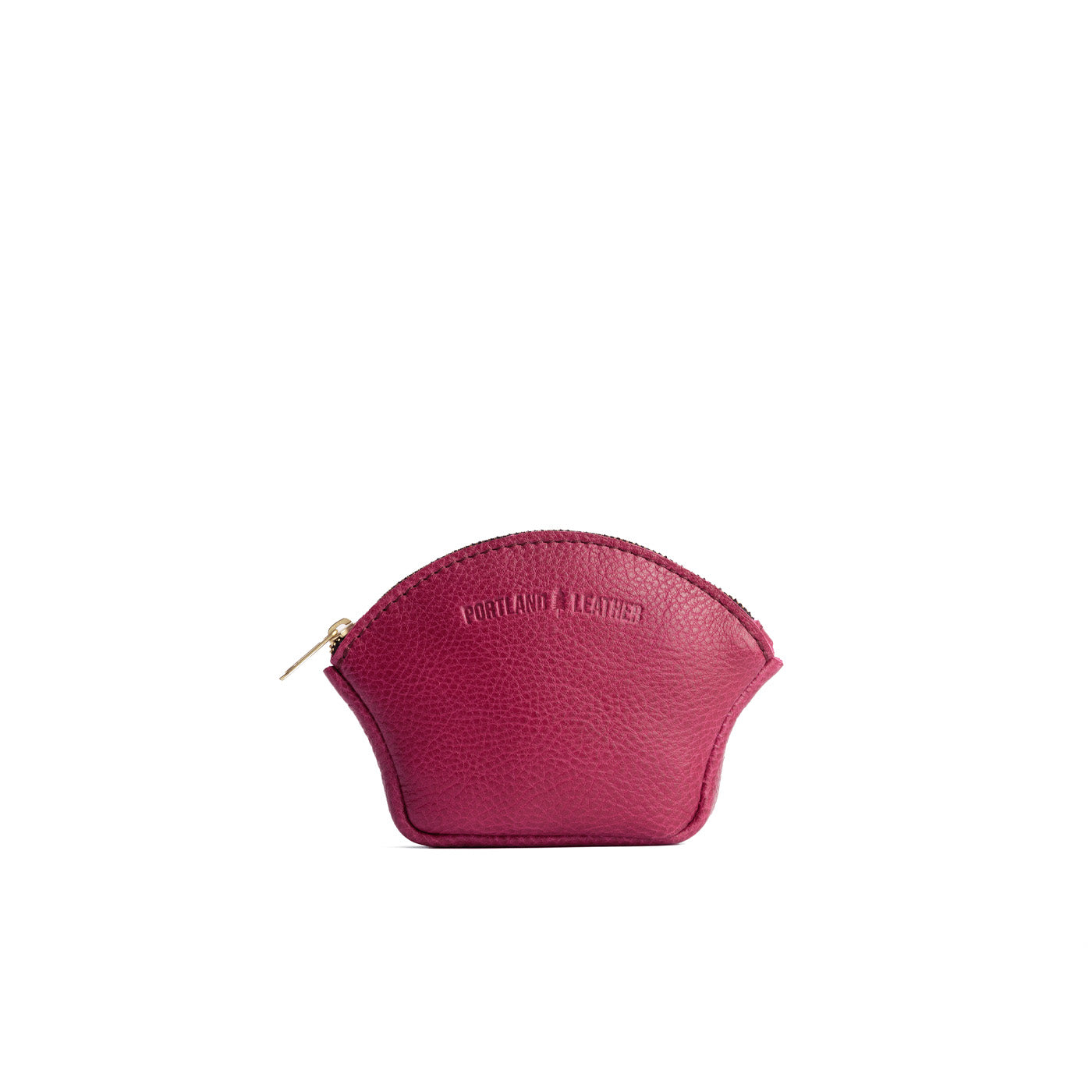 Cosmo*Small | Seashell shaped leather makeup bag with curved top zipper and flat bottom