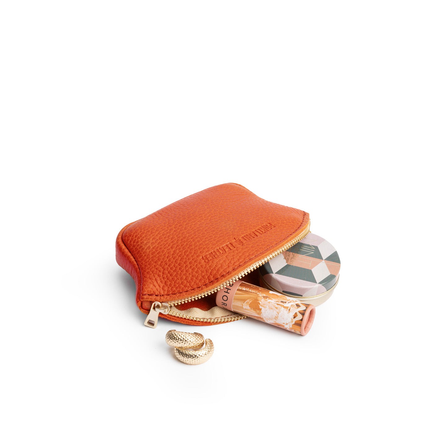 Koi*Small | Seashell shaped leather makeup bag with curved top zipper open and flat bottom