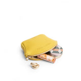 Naples Small | Seashell shaped leather makeup bag with curved top zipper open and flat bottom