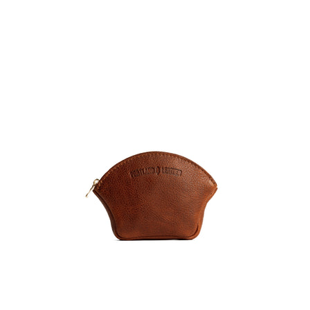 Nutmeg*Small | Seashell shaped leather makeup bag with curved top zipper and flat bottom