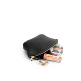 Pebbled--black Small | Seashell shaped leather makeup bag with curved top zipper open and flat bottom