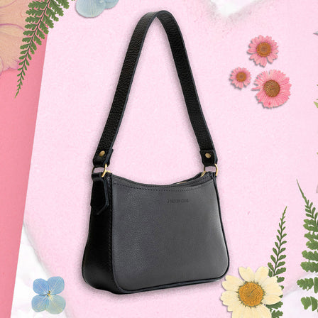  Pebbled--black | Petite bean shaped shoulder bag with a zipper closure