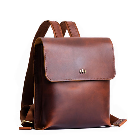 Timber | Rectangular backpack with leather lined nylon straps and magnetic flap closure