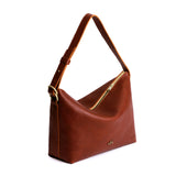 Nutmeg Large | Medium sized slouchy leather shoulder bag with zipper opening and three metal tree emblems