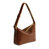 Nutmeg Small | Petite slouchy leather shoulder bag with zipper opening and three metal tree emblems