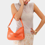 Koi Small | Petite slouchy leather shoulder bag with zipper opening and three metal tree emblems