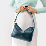 Lagoon Small | Petite slouchy leather shoulder bag with zipper opening and three metal tree emblems