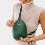 Bacalar | Model wearing small sling bag with zipper closure and adjustable strap