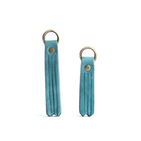 All Color: Aqua | slim leather tassel with brass ring