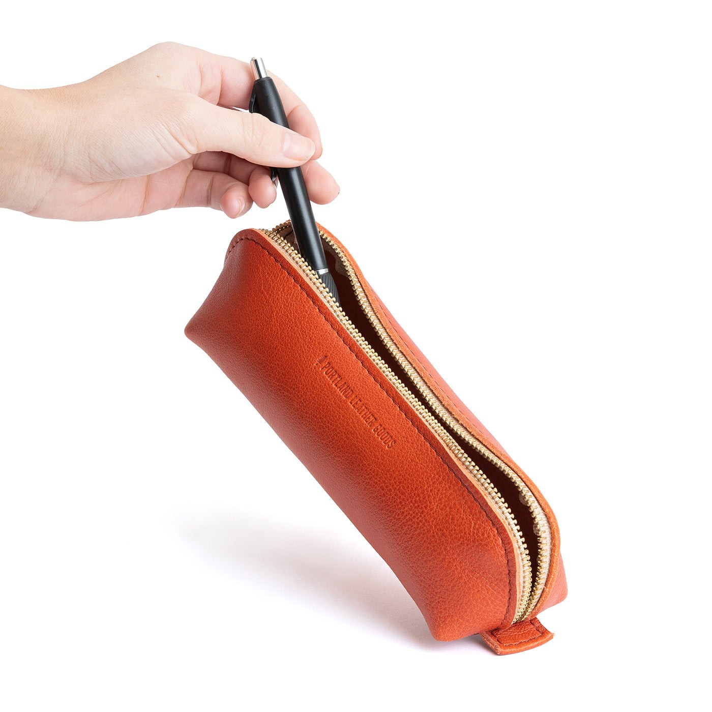 All Color: Koi | Leather pouch with curved seams and top zipper