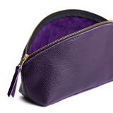 Empire | Spacious leather makeup bag with curved seams and top zipper