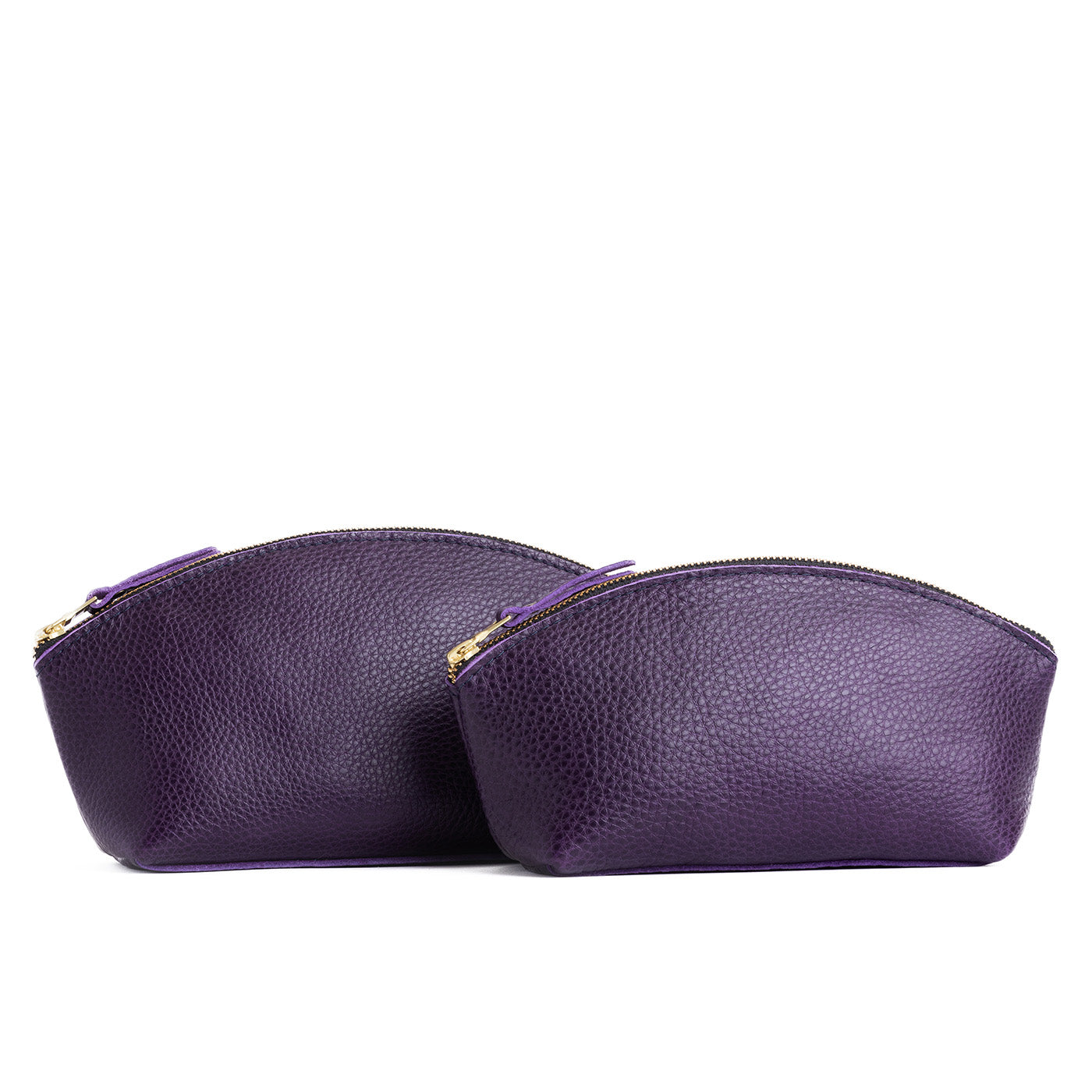 Empire | Spacious leather makeup bag with curved seams and top zipper