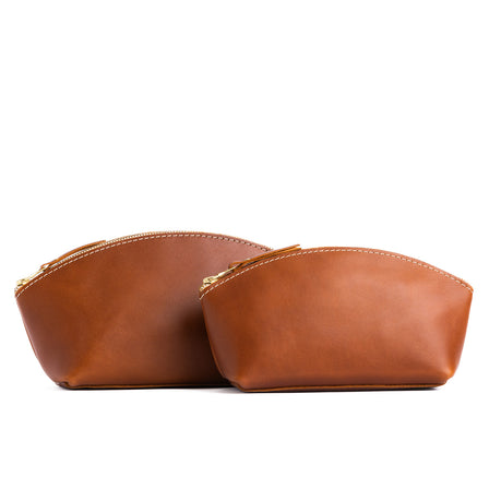 Honey | Spacious leather makeup bag with curved seams and top zipper
