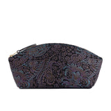 Masquerade Total Eclipse | Spacious leather makeup bag with curved seams and top zipper