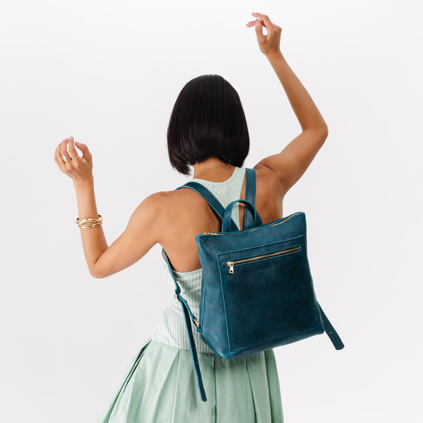 Lagoon | Model wearing square slim leather tote backpack