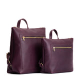 Plum | Side by side comparison of both sizes of Tote Backpack