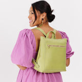 Sugar Snap | Model wearing square slim leather tote backpack