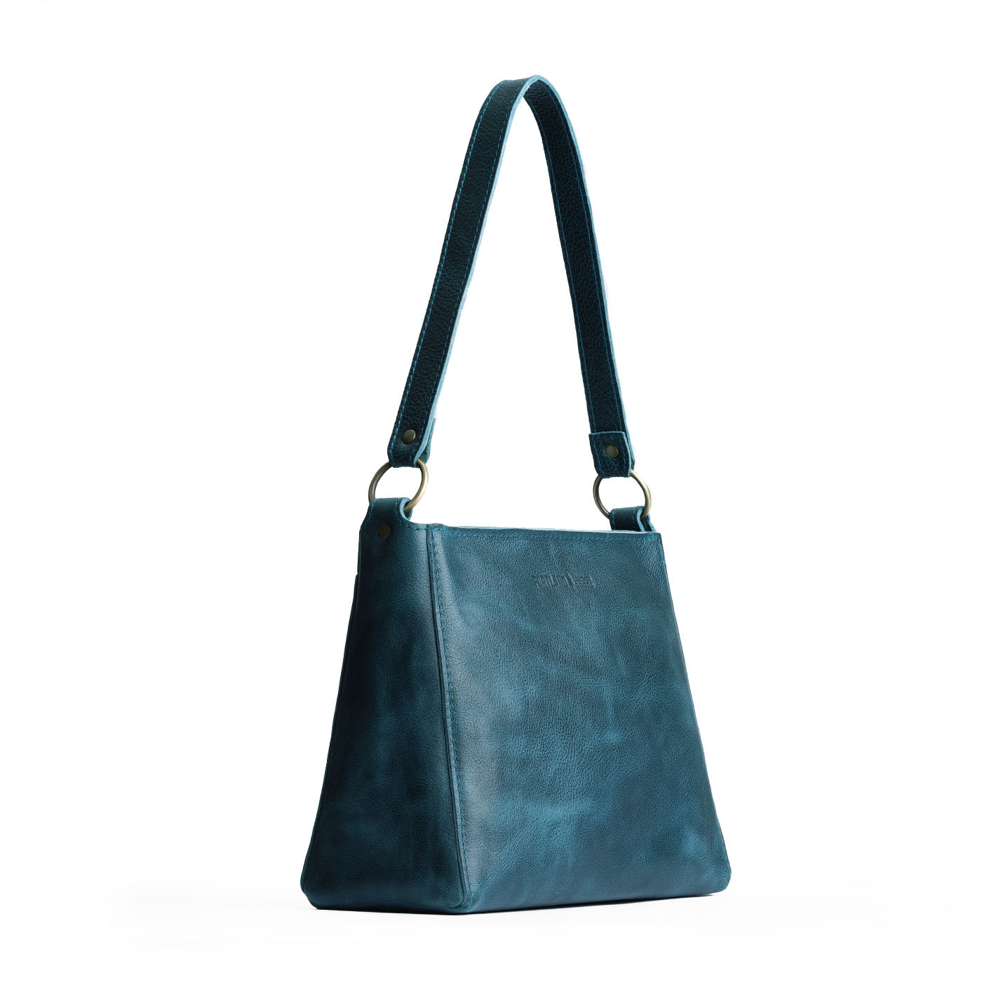 Lagoon | Triangular shoulder bag with antiqued brass finished hardware