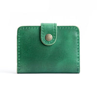 Cowboy Mint | Small leather bifold wallet with snap closed