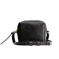  Black | Square crossbody bag with top zipper and leather pull tab