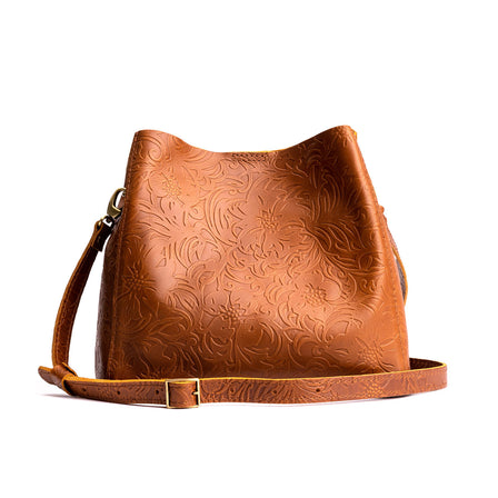  Meadow | symmetrical bucket bag with latch closure and removable crossbody strap