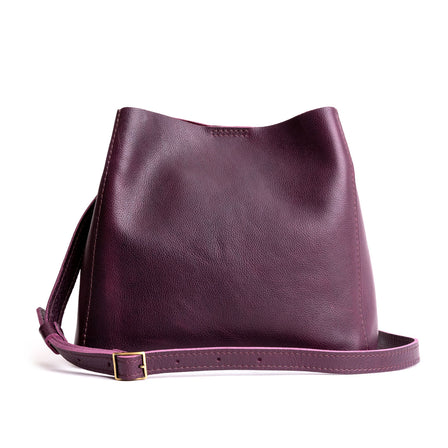  Plum | symmetrical bucket bag with latch closure and removable crossbody strap
