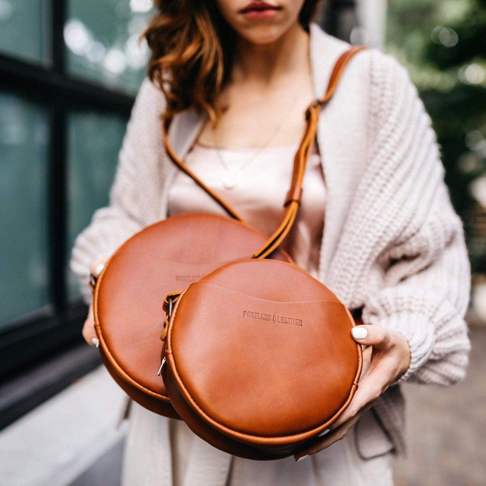 Round leather cross body bag on sale